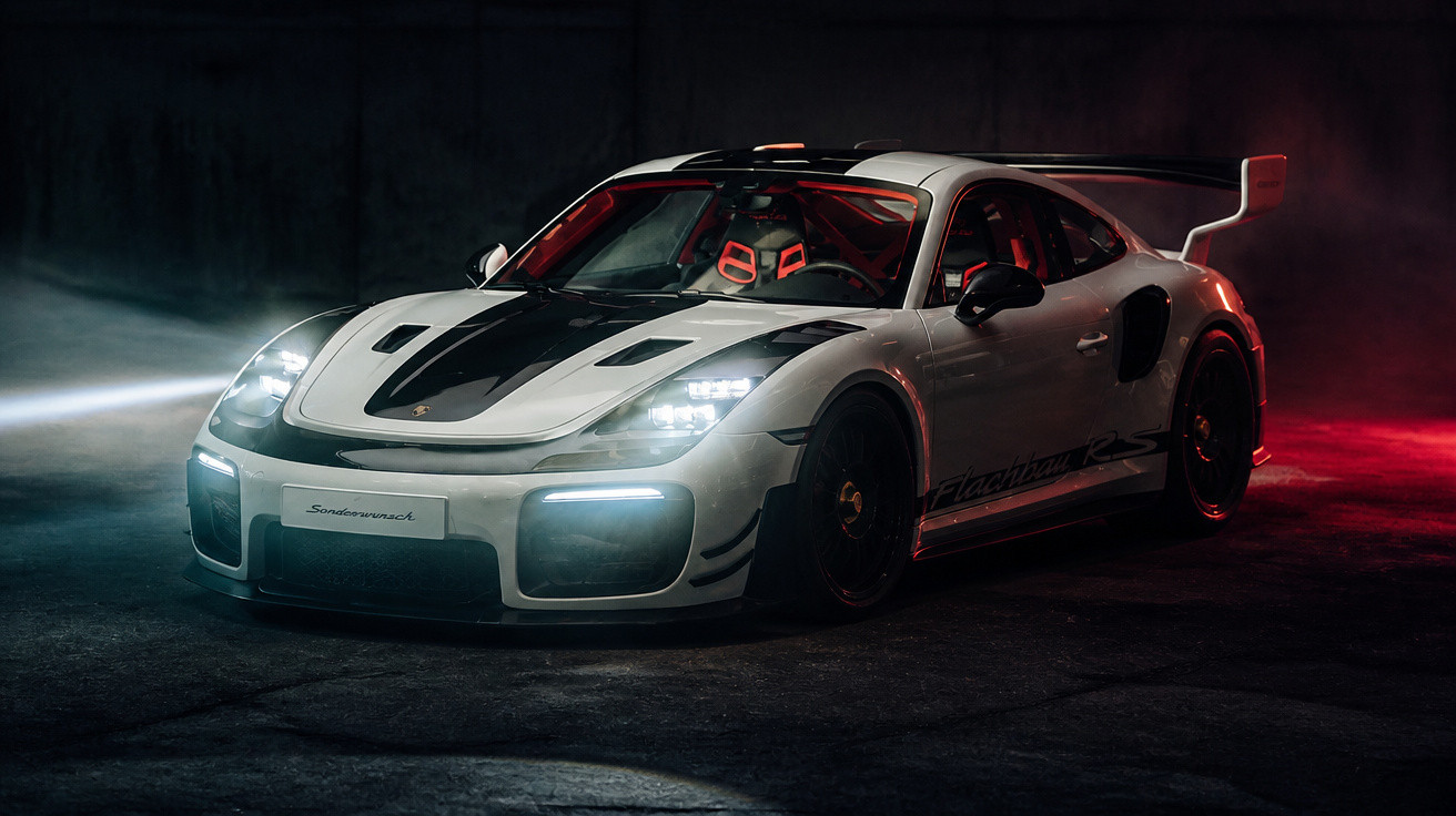 White Porsche sports car with black racing stripes and red interior lights in a dark setting